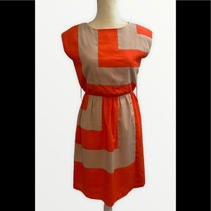 Adorable orange and oatmeal 60s style geometric print dress. Size 4.